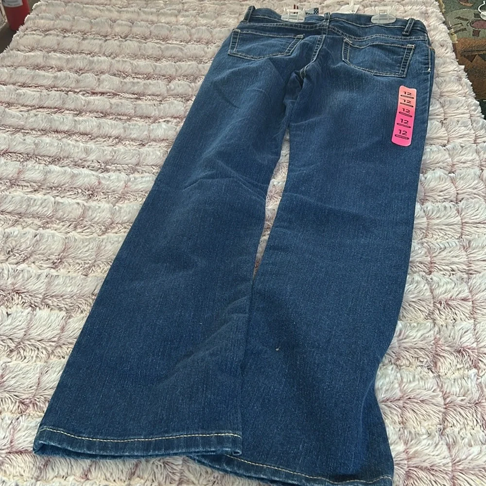 The children place Girl jeans size 12